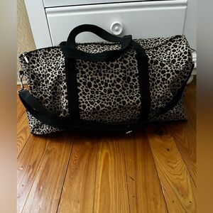 Leopard Print Vintage Duffle Bag With Black Straps and Bottom